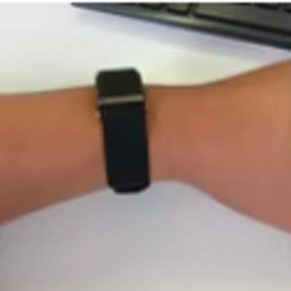 Customer photo of a black Pulse wristband